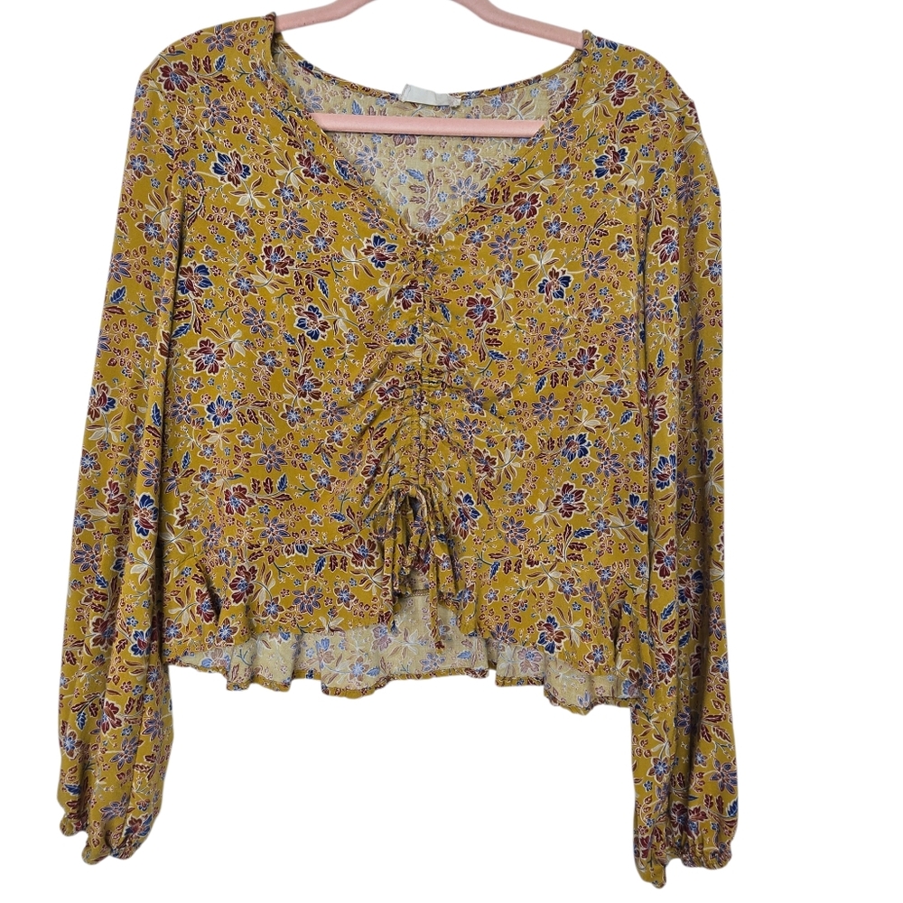 Altar'd State women's long-sleeve blouse in a yellow/mustard color with florals